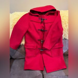 This is an Original Montgomery red Duffle Coat, size 44, from England, UK.